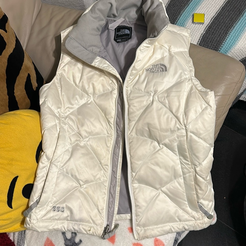 White with gray inside women’s north face vest